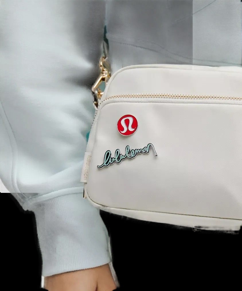 Lululemon Collectible Pins 2 Pack Lulu Red/Ideal Mint - HypeFly India View 2