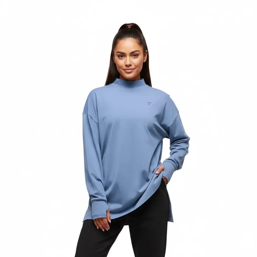 gymshark-covered-longline-cotton-long-sleeve-top-worn-blue