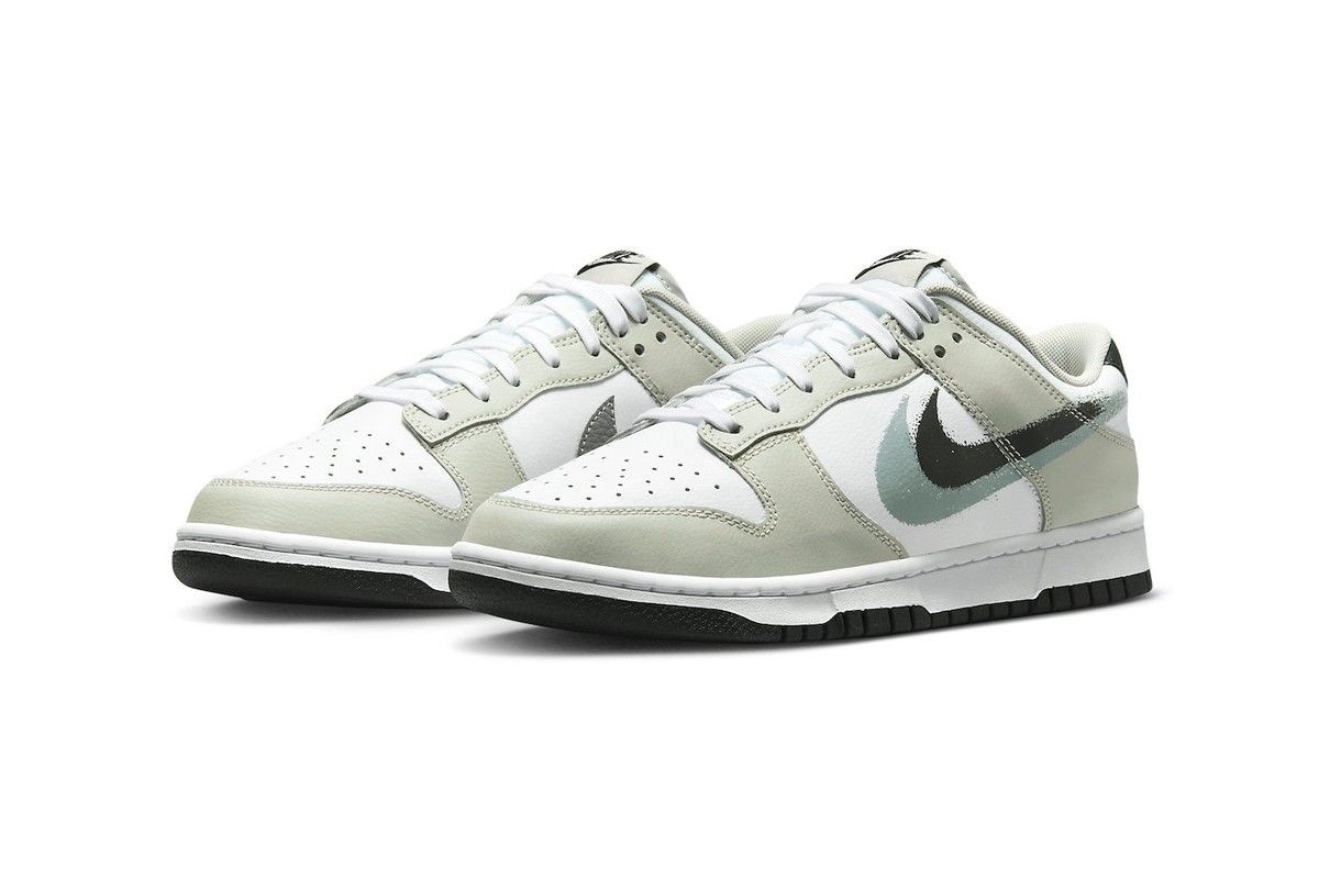 https___hypebeast.com_image_2022_10_nike-dunk-low-spray-painted-swoosh-FD0661-100-release-info-003.jpg